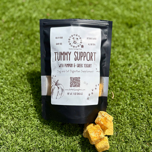 Bag of 'Tummy Support' supplement with yellow chunks on grass